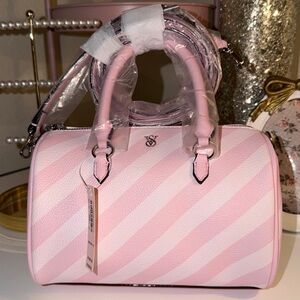 Brand new with tags. Victoria's Secret mini Crossbody duffel bag